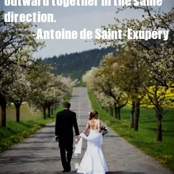 Love does not consist of gazing at each other, but looking outward together in the...